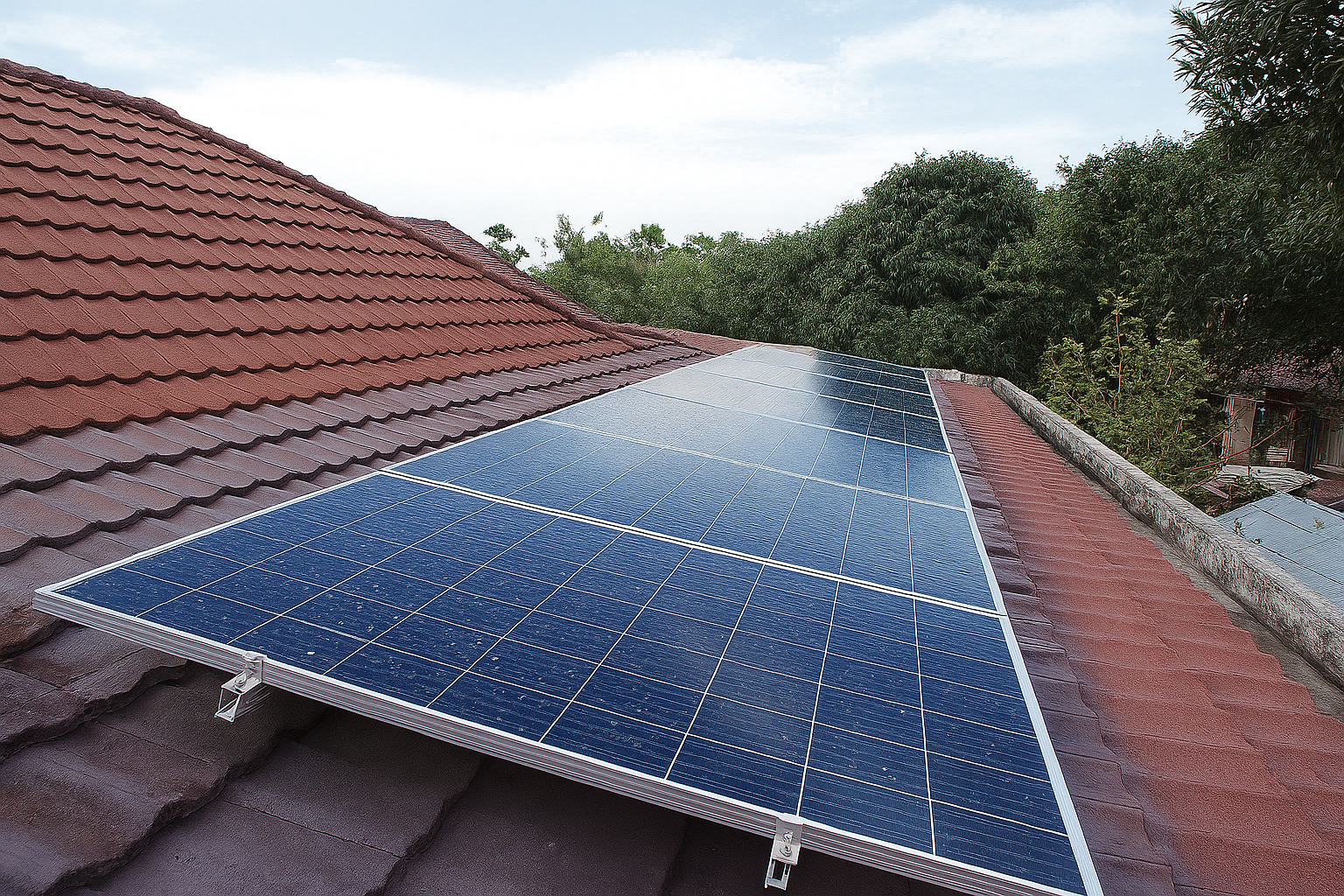 Medical team reviewing solar-powered equipment